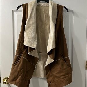 Country western style faux suede and fur vest